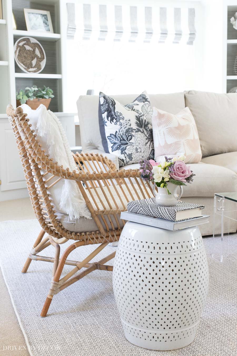 This white ceramic garden stool is one of my all-time best home purchases! Perfect for a side table in my living room and drink table on my patio!