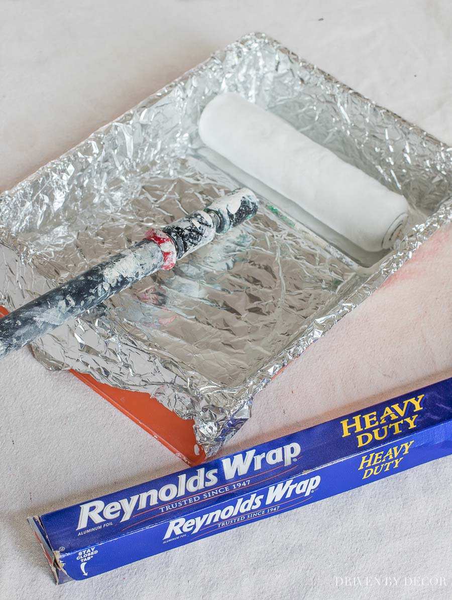 Why didn't I think of this?! So smart to use foil to line your roller tray. Definitely check out all of the other time-saving painting tips in this post!