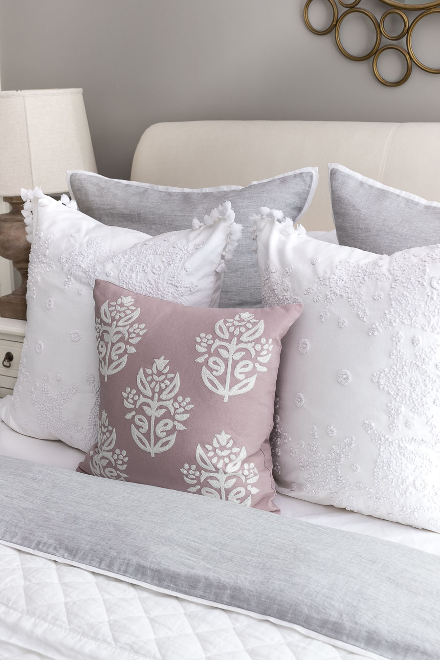 The perfect pillow combination for a queen bed! Two Euro shams, two 22-24" square pillows, and one smaller square or rectangular pillow.