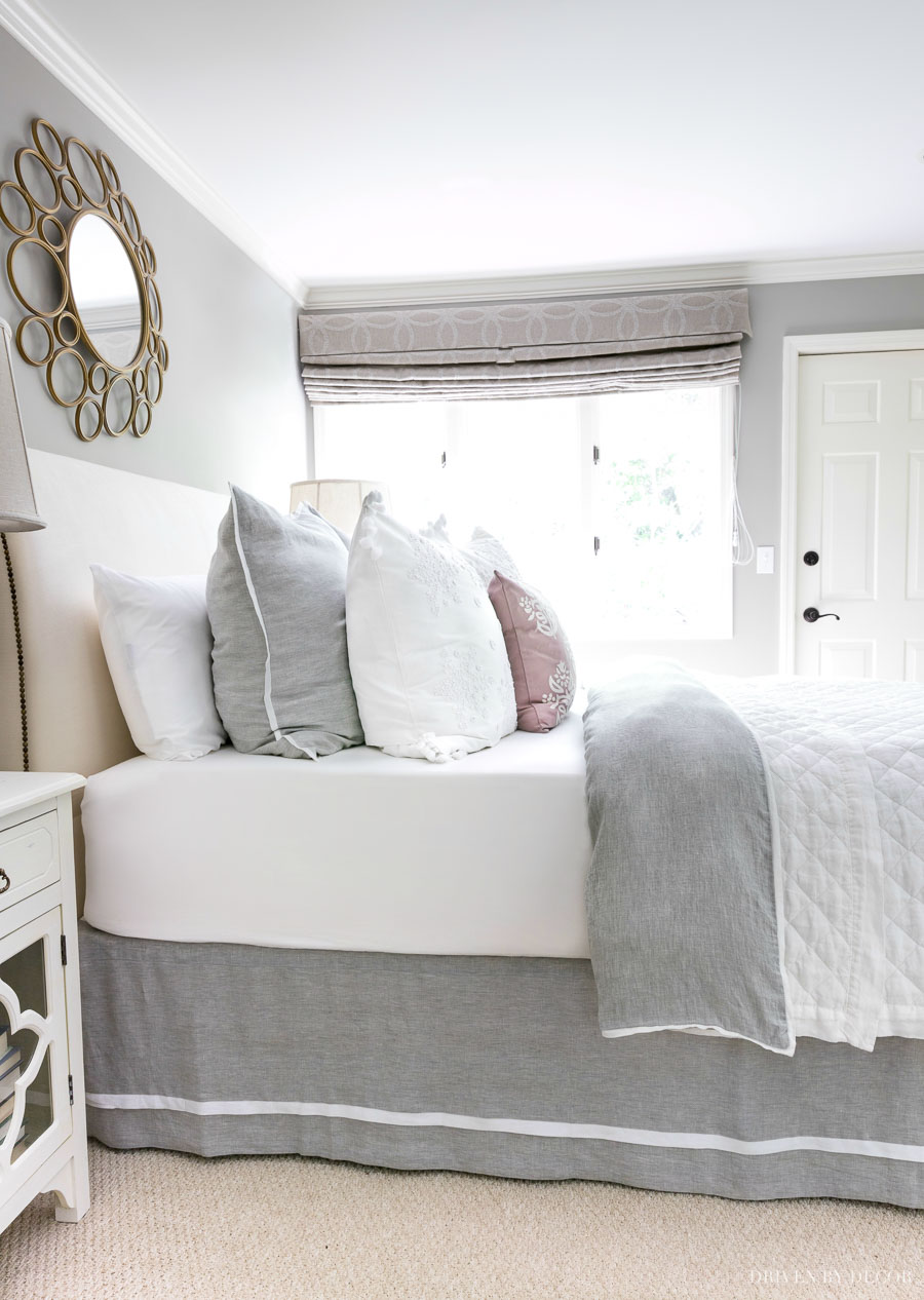 The perfect quilt, duvet, and bedskirt combination! Love the idea of using classic, neutral bedding pieces and switching things up with a simple change of pillows!