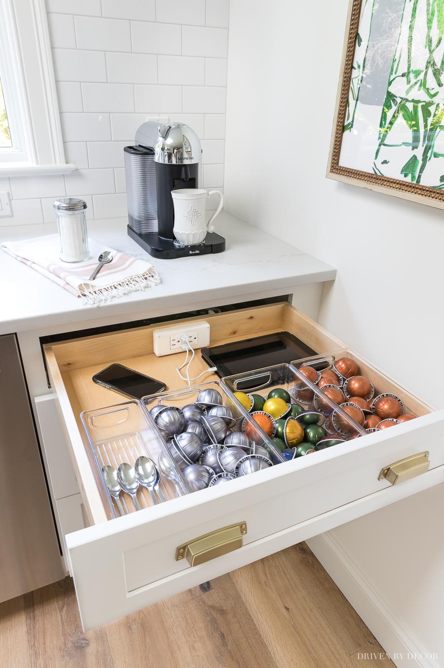 An outlet with USB ports is built into this kitchen drawer! Love having a hidden place to store electronics and plug in small kitchen appliances!