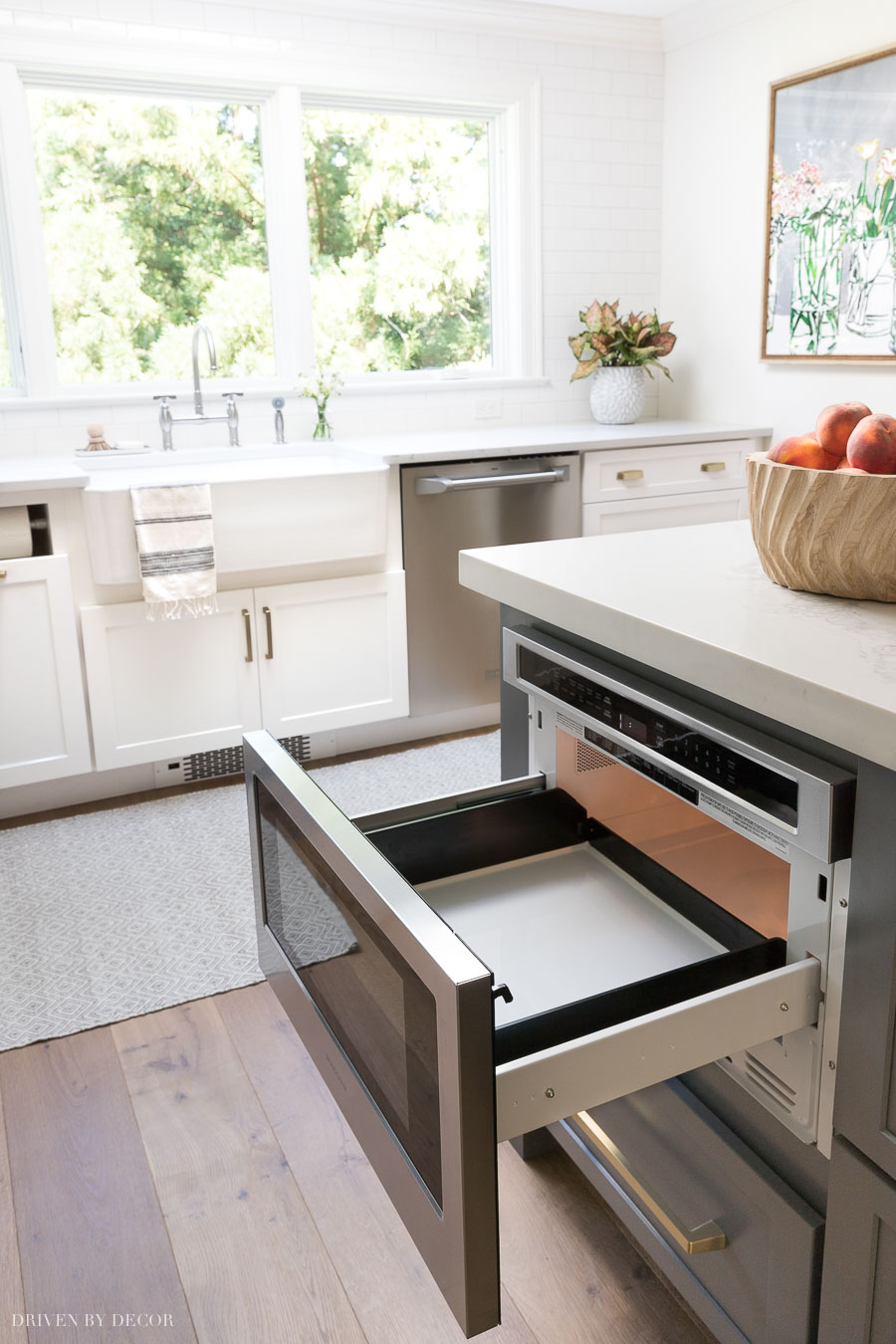 I wasn't sure if I would like having a microwave drawer in my kitchen island, but I LOVE it! More details about it in my kitchen remodel reveal!