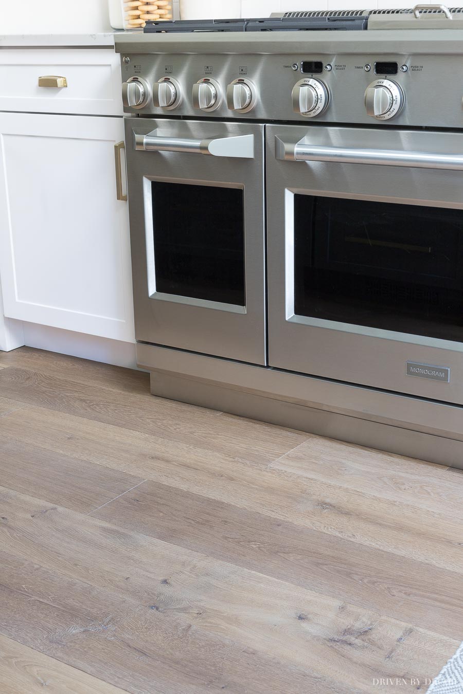 Gorgeous engineered wood flooring used throughout this kitchen! Hallmark's Alta Vista flooring in Malibu