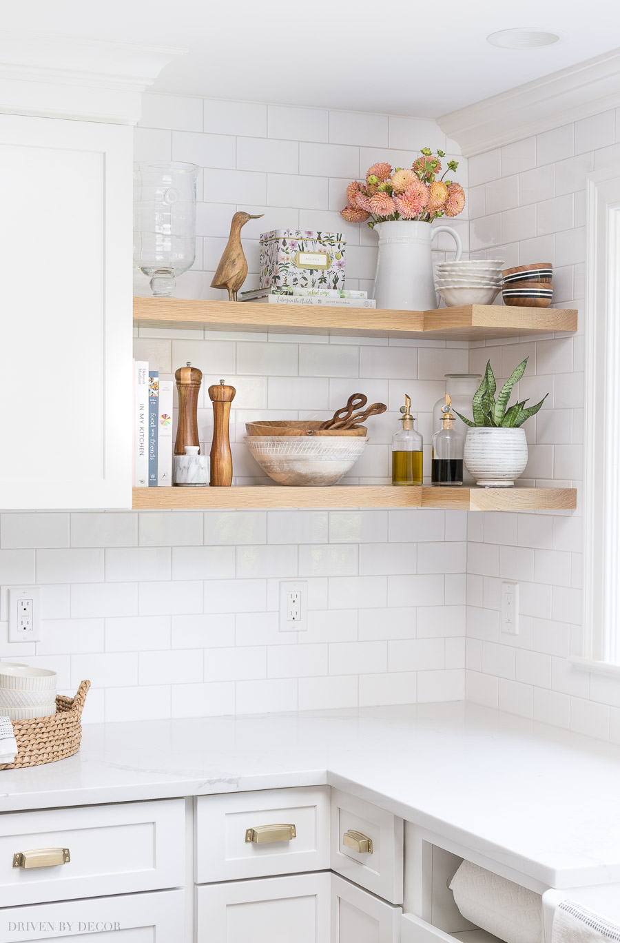 Totally stealing ideas for what to put on my open kitchen shelving - love these accessories! Also how the shelves wrap around the corner!