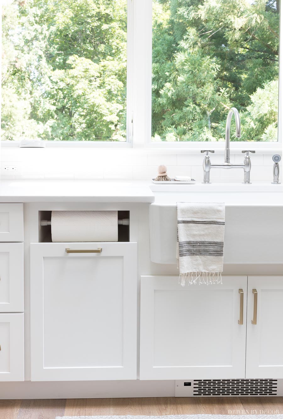 Love this built-in paper towel holder that's part of the kitchen cabinets! No more towel rolls sitting on the countertops!