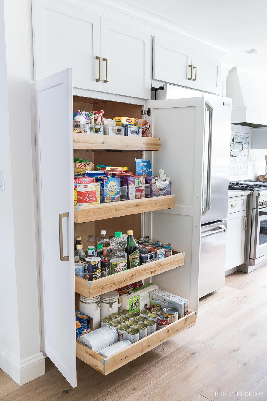 Dream pantry! Wide pantry with roll out shelves for tons of storage plus you can see everything (even stuff in the back!)
