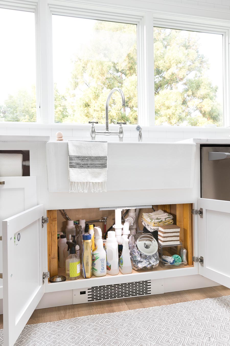 Love this idea for lighting up the inside of a cabinet! Install motion strip lighting so when the doors of the cabinet are opened, the battery-operated light illuminates what's inside! Perfect for under the sink!