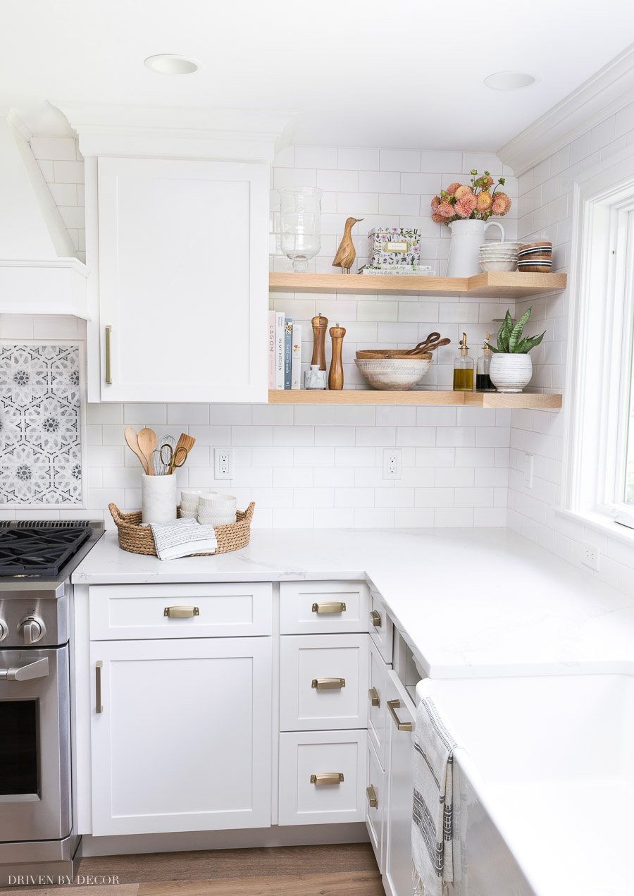 Open wood shelving that wraps around the corner - one of my favorite details of this kitchen remodel!