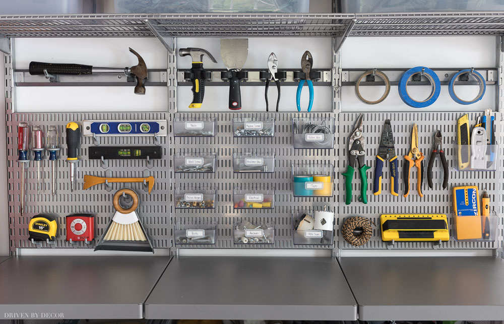 How I organized my most used hardware and tools in our garage! Love Elfa's utility boards, hooks, and bins!