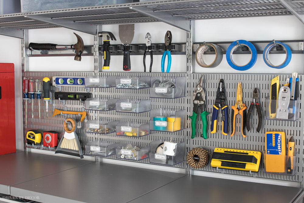 These Elfa utility boards are the best! Awesome way for organizing all of your most-used tools and hardware in your garage!