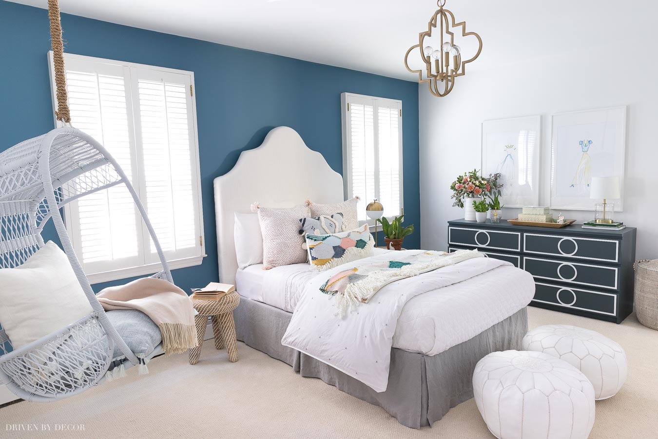 Love the blue accent wall (Behr Marquee's Blueprint paint color) in this boho chic bedroom!