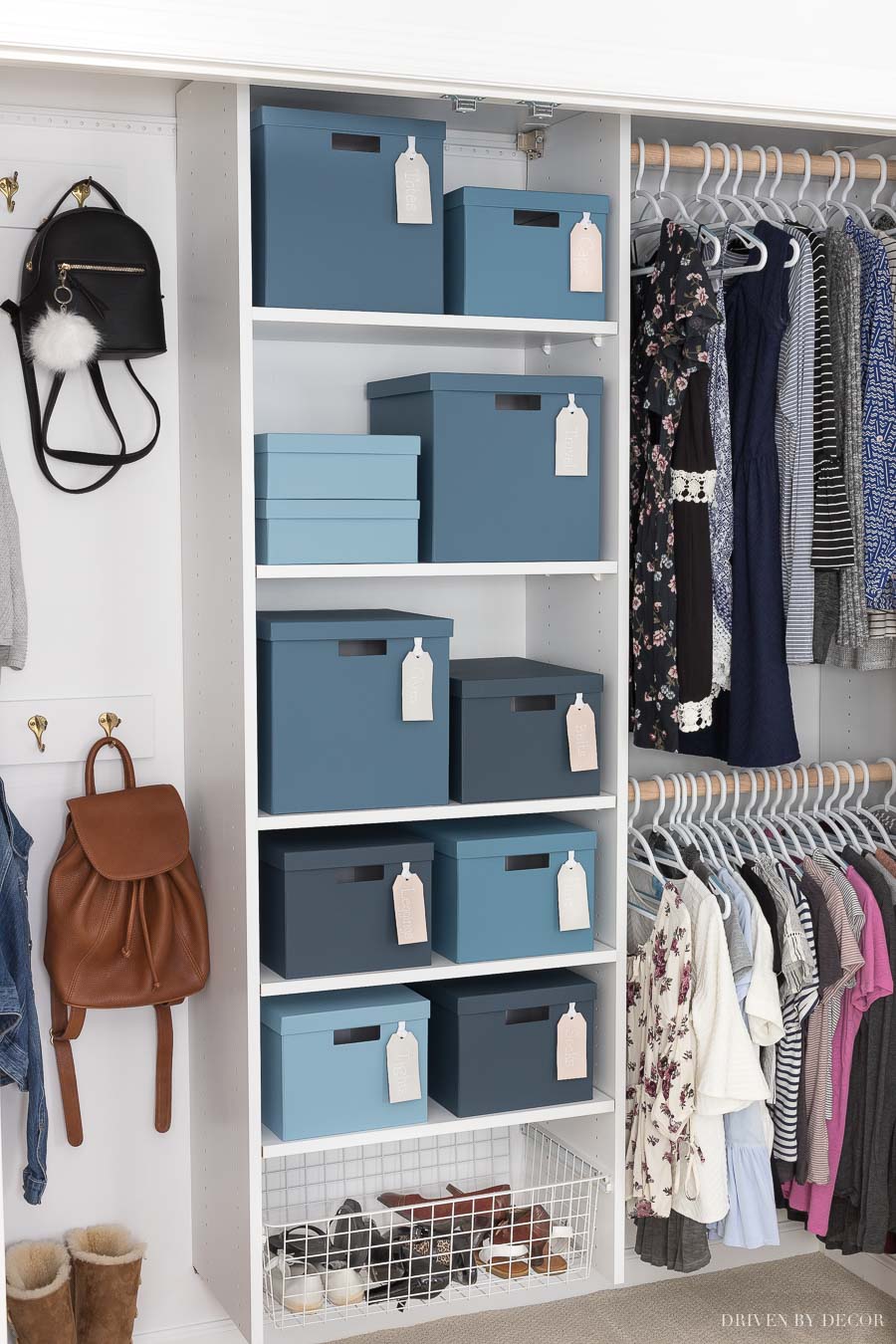 Closet system painted with with blue painted boxes for storage - so cute!