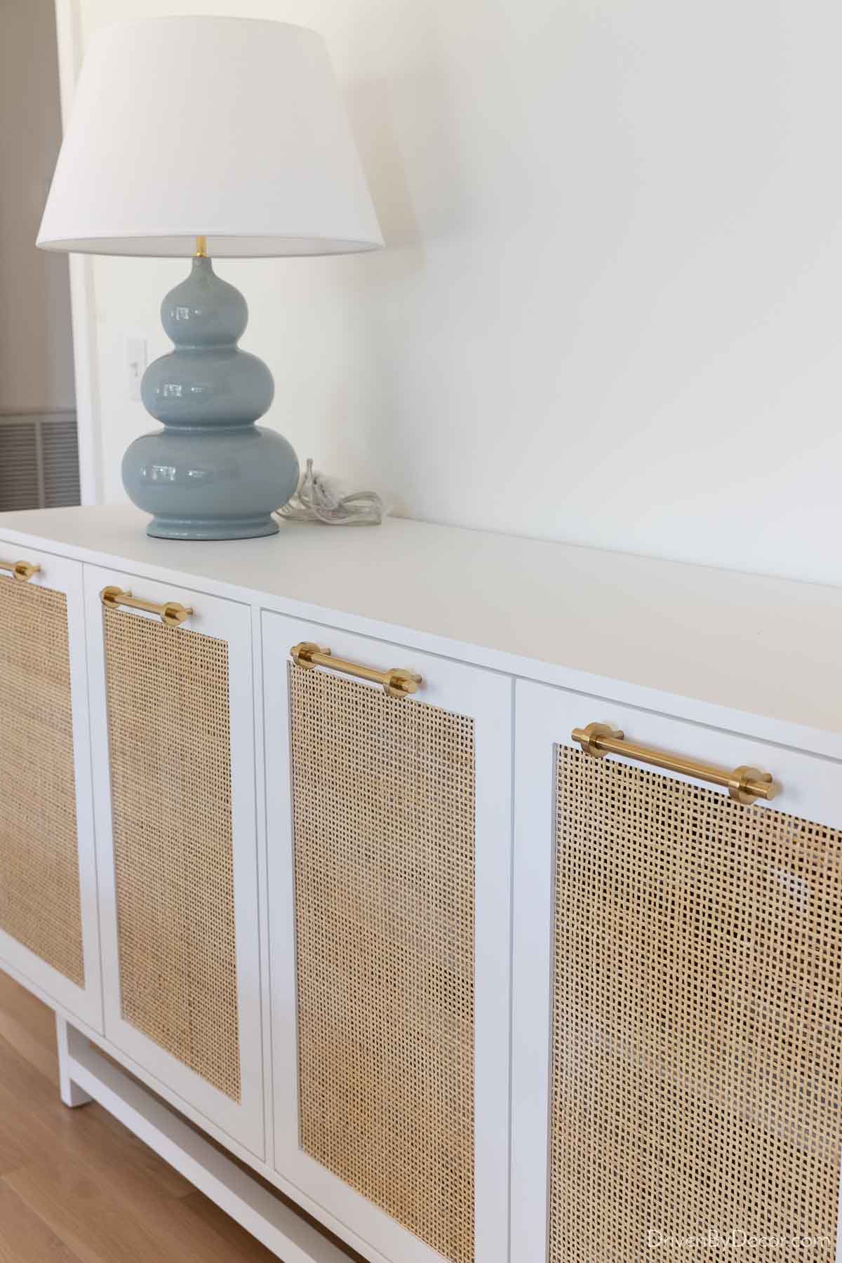 White cane sideboard in our dining room