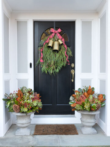 Our Christmas door swag and holiday planters - full tutorial included in post!