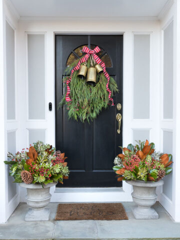 Our Christmas door swag and holiday planters - full tutorial included in post!