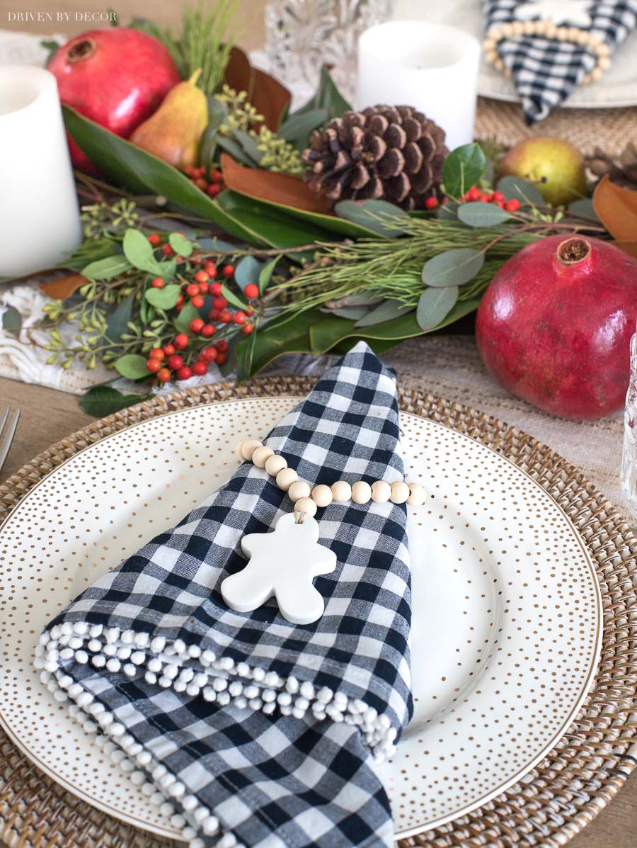 These wood bead + clay napkin rings are the cutest for Christmas! Source linked in post!