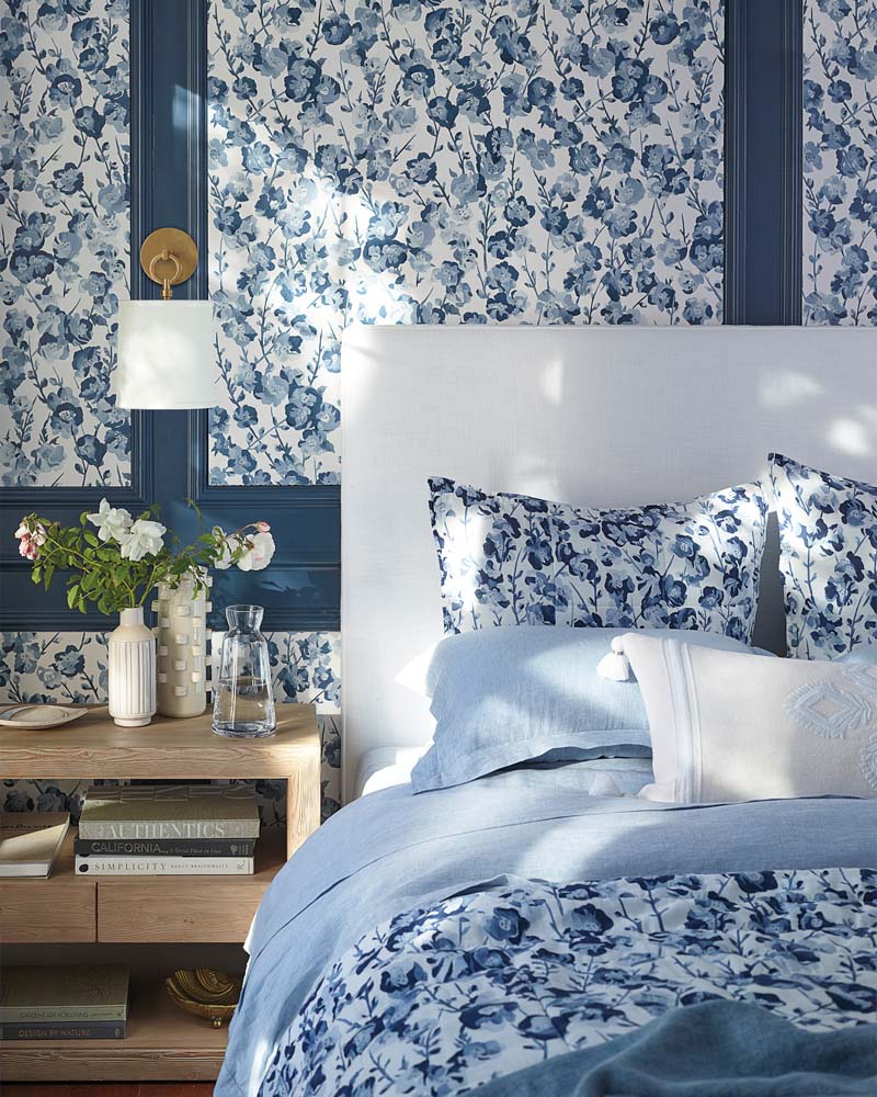 Gorgeous blue floral wallpaper! Love the idea of using it as an accent with wall molding! One of my favorite 2019 trends!