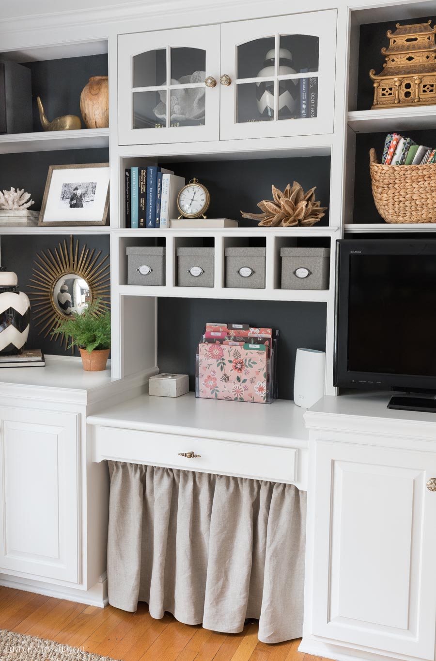 Our home mail organizer station hidden behind a DIY desk skirt - click through for all the details!