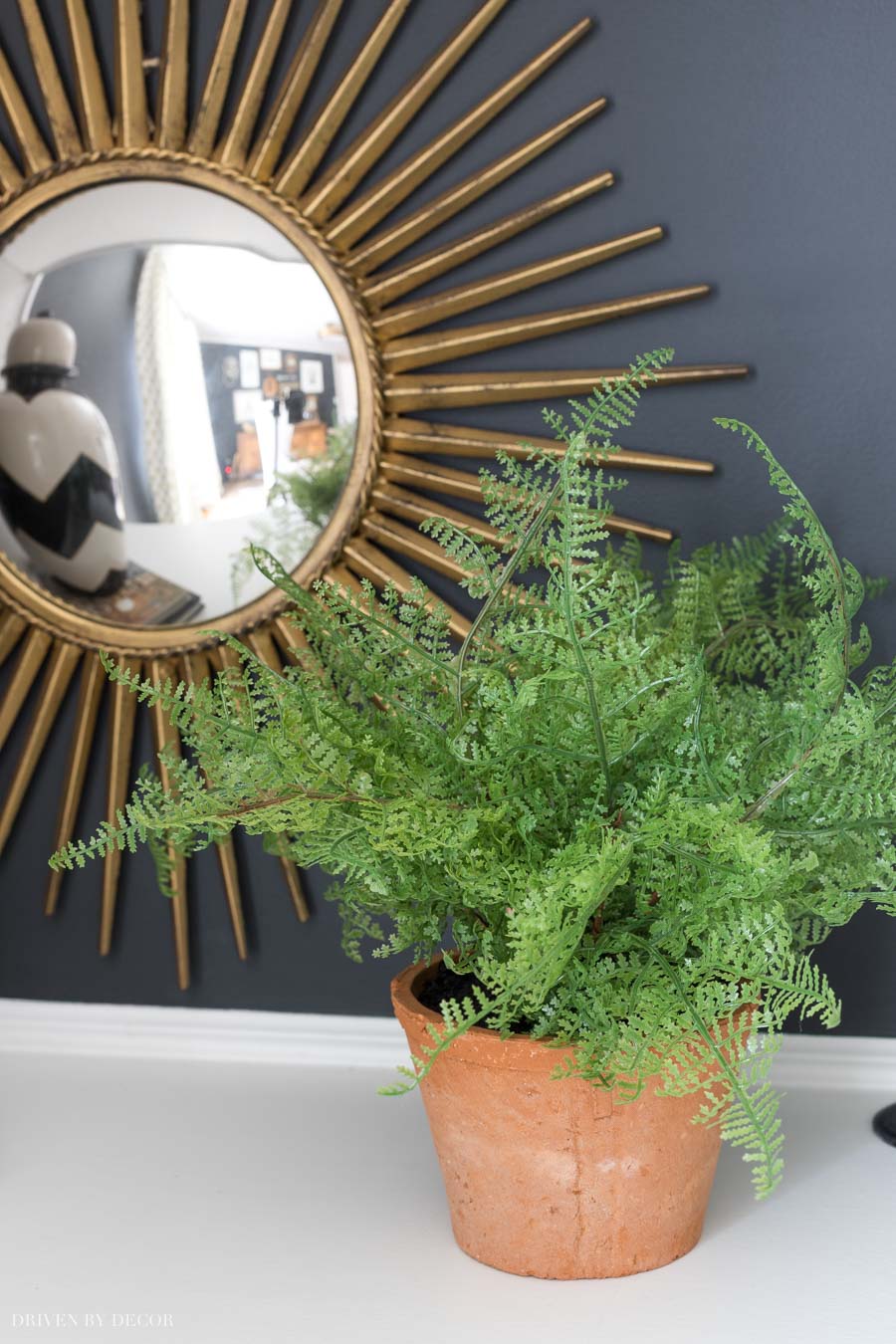 A realistic faux fern - perfect for low light areas!