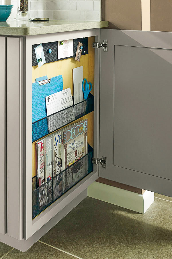 Base cabinet with side panel opening up to reveal a message center