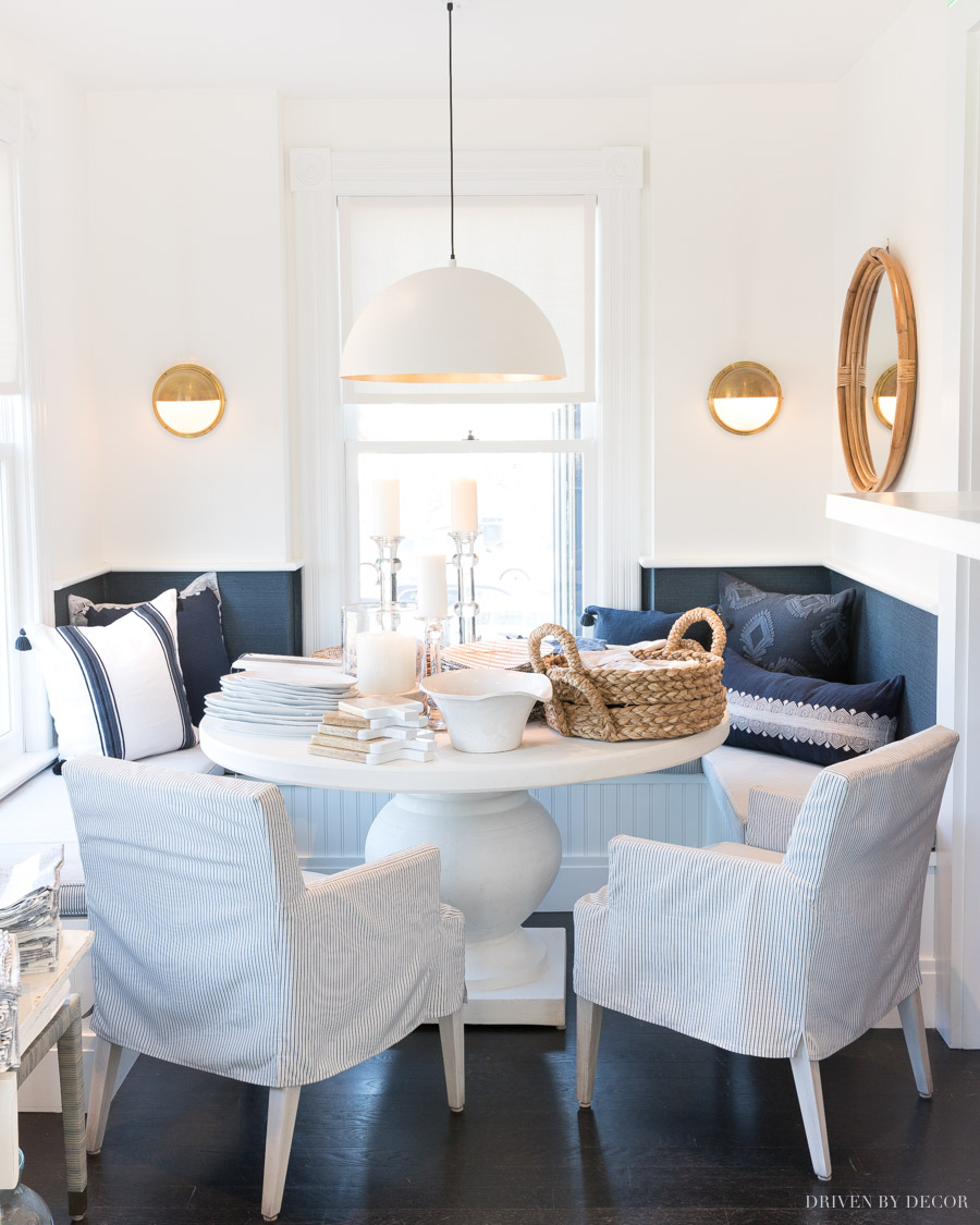 Stunning built-in banquette with blue and white decor