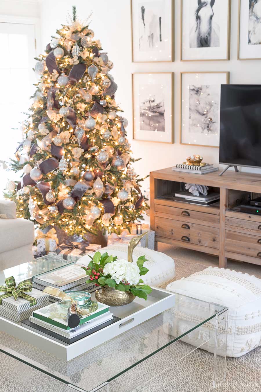 Beautiful coffee table styling! Love the brass swan planter!