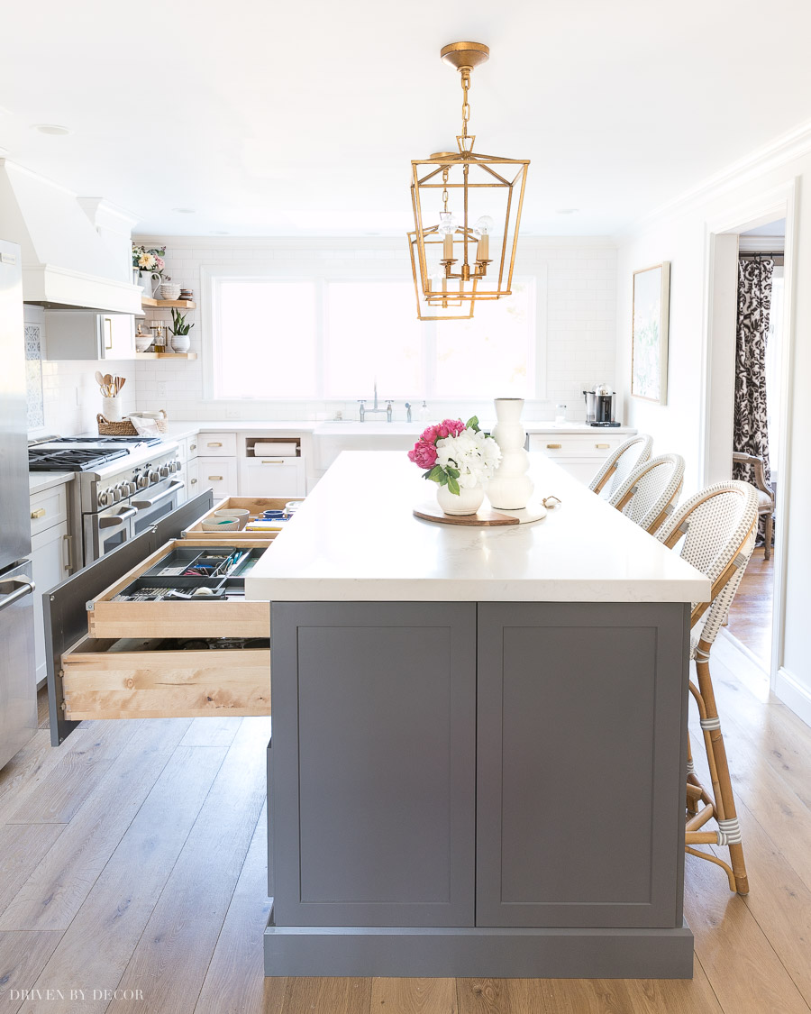 Love the idea of a smaller rolling drawer within the larger drawers of this kitchen island!