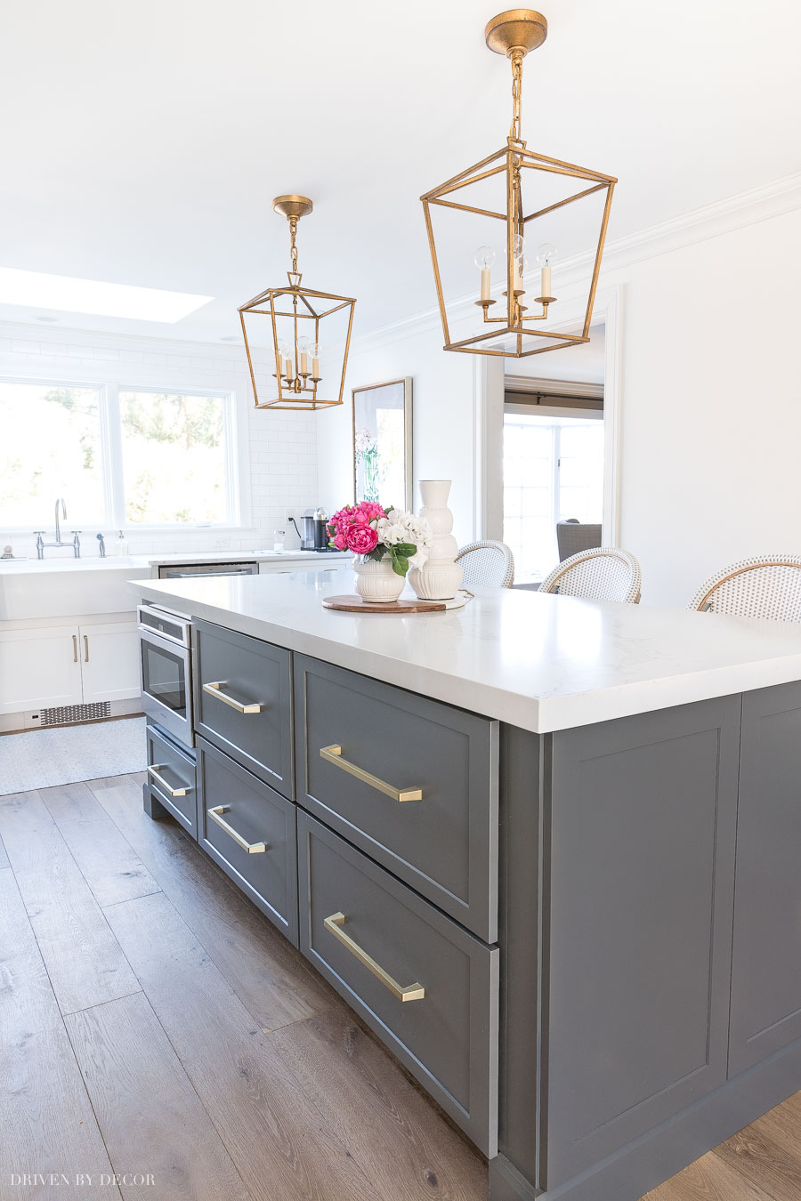 Loving the hidden kitchen command center in the drawer within the drawer of this kitchen island!