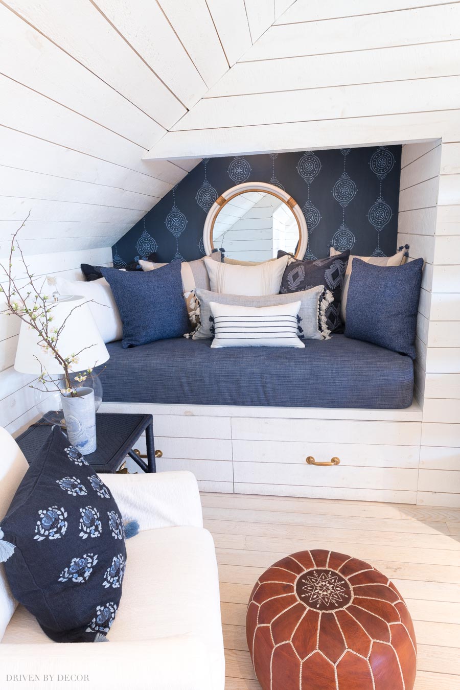 Gorgeous blue on blue wallpaper in this super cozy bed nook!