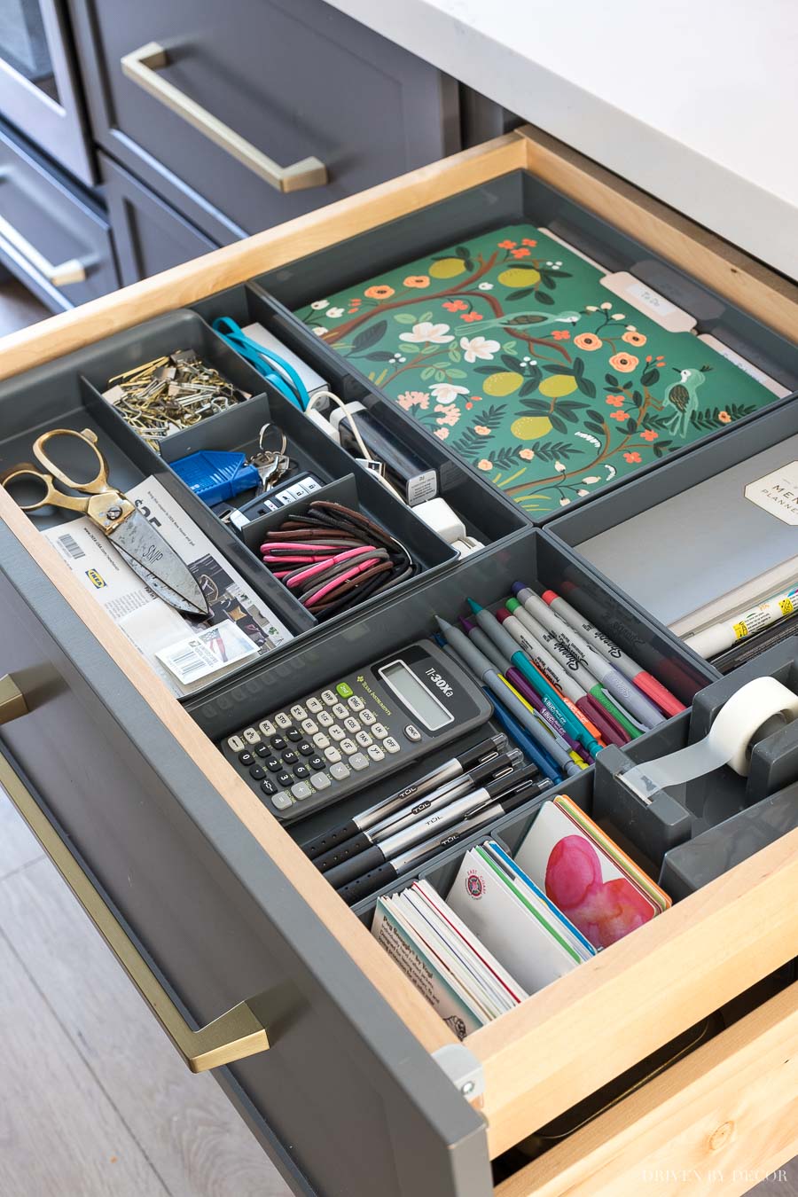 So smart! Hidden kitchen command center organized in a shallow kitchen drawer!