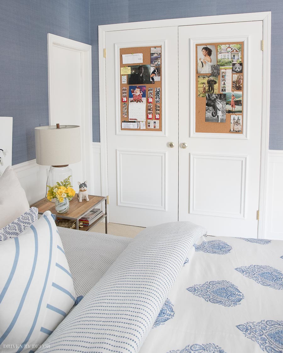 Loving this closet door idea for a teen bedroom - cork boards and molding were added to flat closet doors!