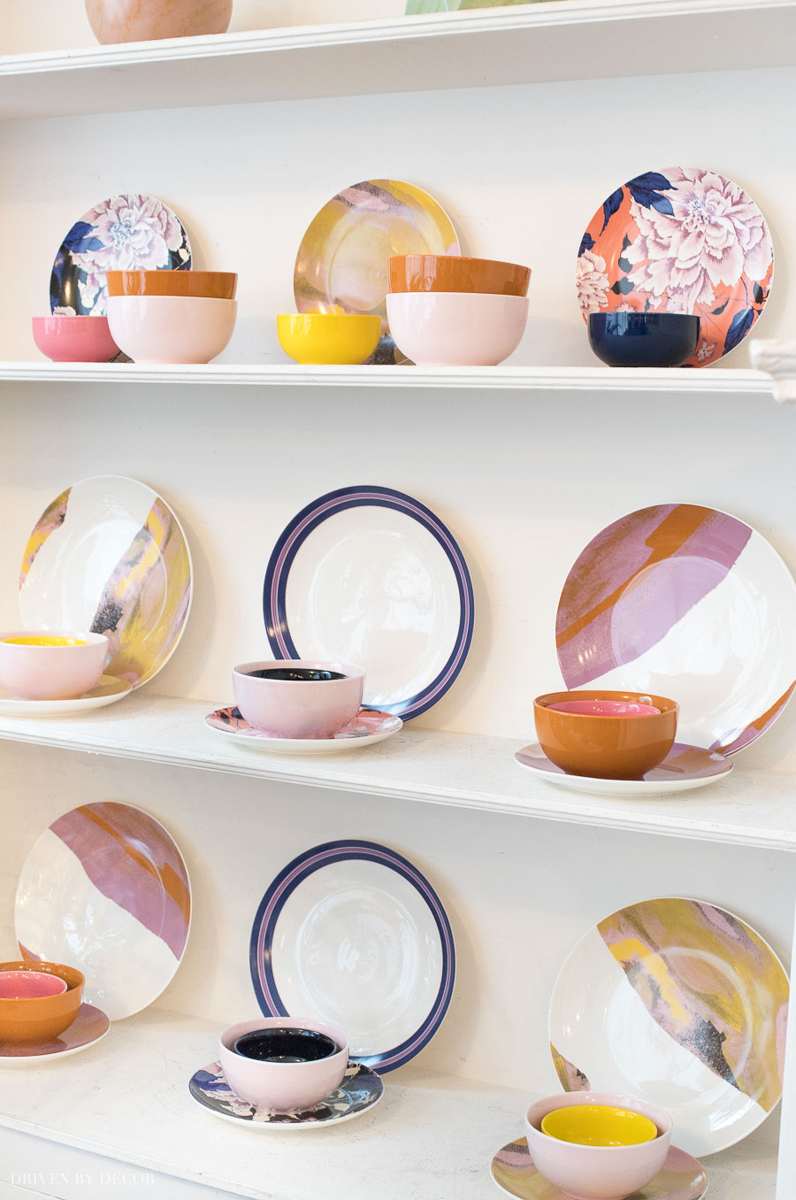 Love the combination of stripes, patterns, and solids in Drew Barrymore's Flower Home dinnerware