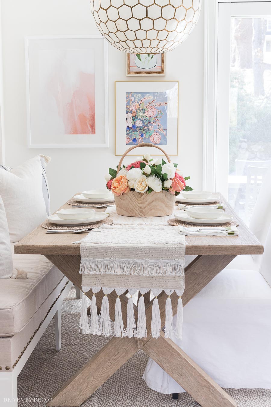 Love the gorgeous wood dining table in this kitchen eat-in area!