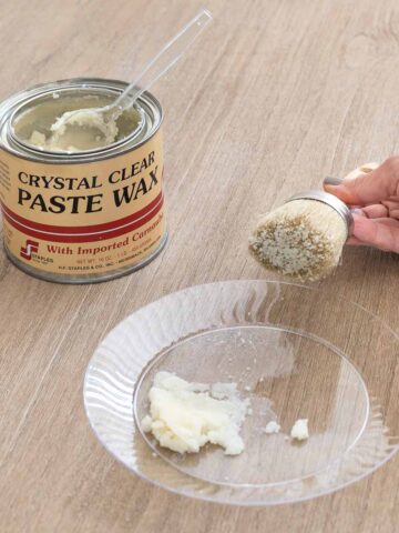 Wax and wax brush to protect wood dining table