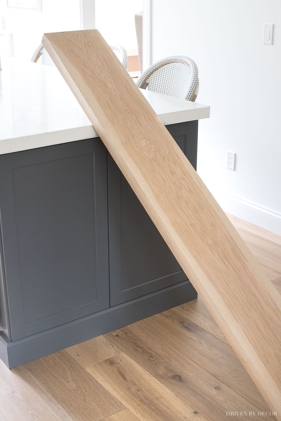 The white oak boards used to create the floating corner shelves in our kitchen