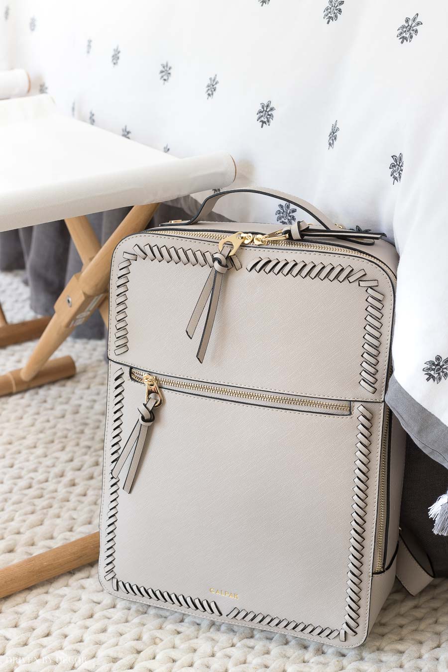 LOVE this stylish laptop backpack that's roomy enough to hold a laptop and a whole lot more!