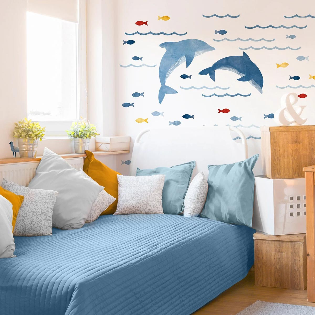 Love these dolphin wall decals as above bed decor