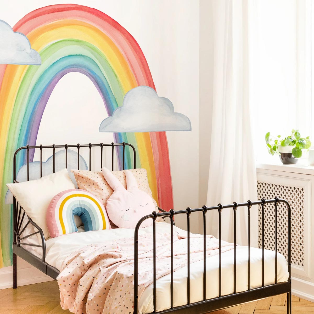 Love this large rainbow decal as above bed decor