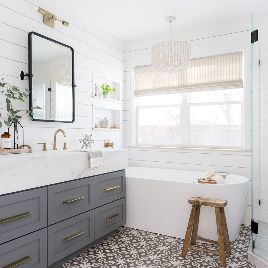 Love how they were able to add a bathtub in a smaller bathroom! Gorgeous!