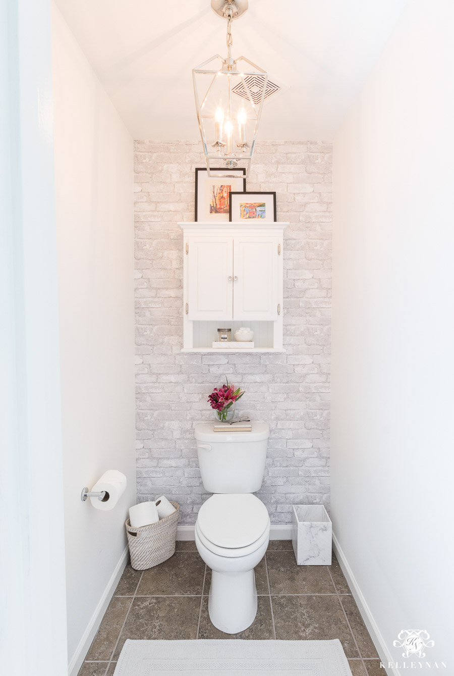 Love having a separate toilet area in master bathrooms like this beauty from the home of Kelley Nan