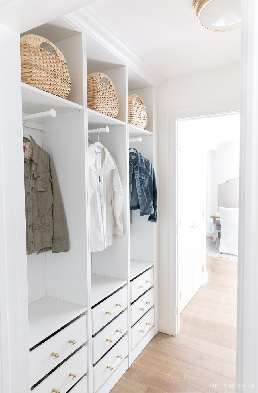 LOVE the built-in look of this open coat closet and drawers with shoe storage - made with IKEA PAX wardrobes!