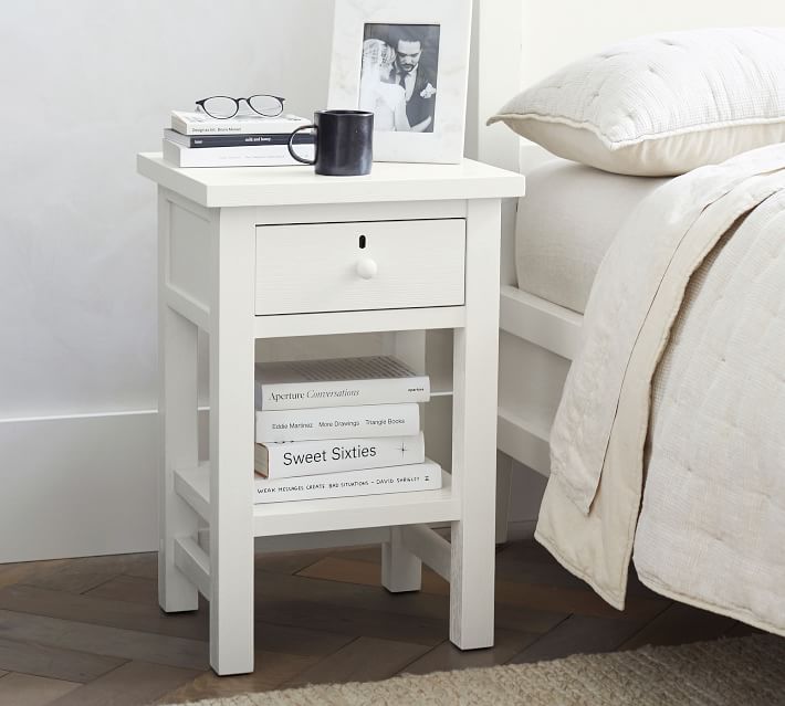 A narrow nightstand with a super simple design