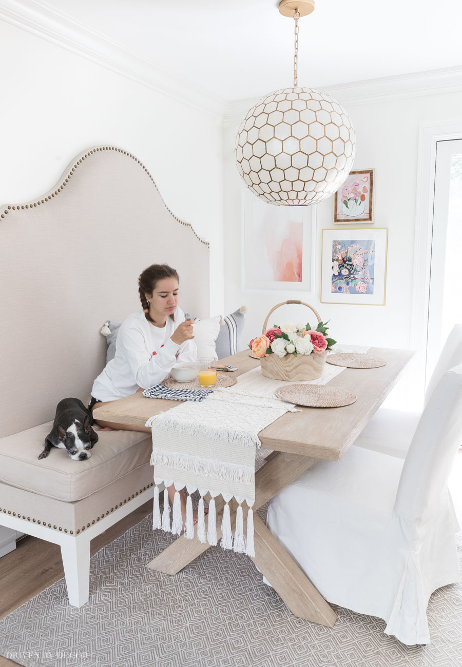 Sunbrella indoor/outdoor fabrics are amazing for when you have pets! That's what we upholstered our banquette with! Super cleanable and wears well!