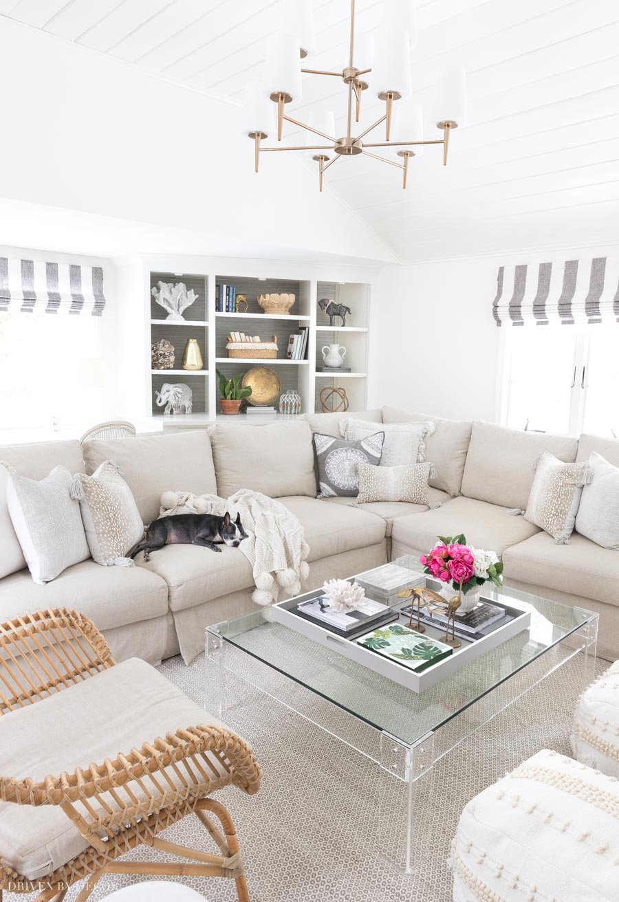 Great post on keeping a clean house with pets! Loving this slipcovered sectional!