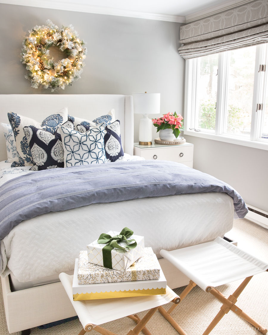 white bedding with colorful pillows