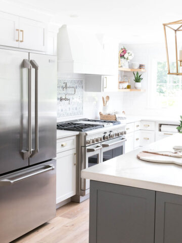 Stainless steel refrigerator in kitchen