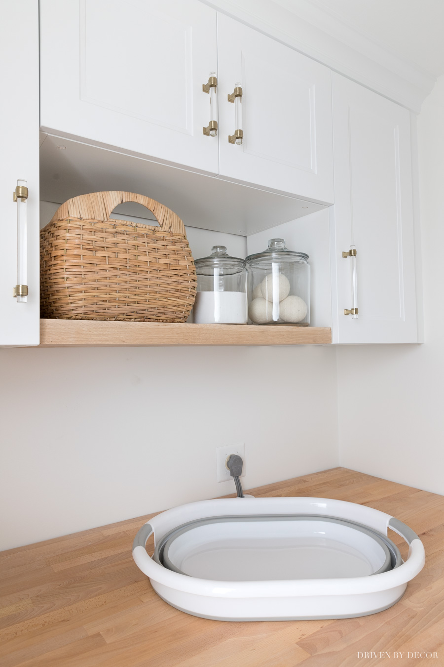 This collapsible laundry basket is perfect for storing in small spaces when not in use!