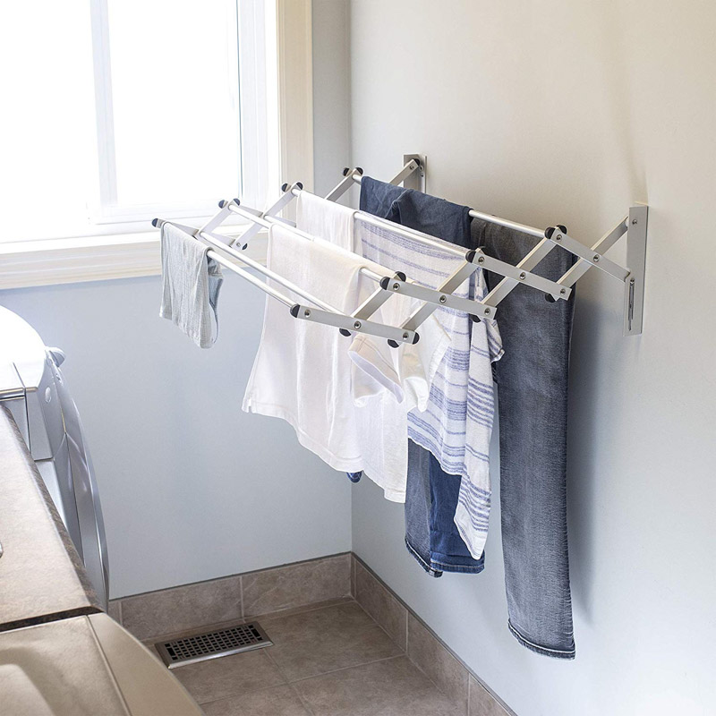 Would love to add this expandable wall mount drying rack to our laundry room! Link in post!