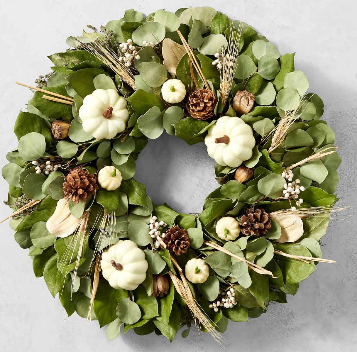 Fall eucalyptus wreath with white pumpkins