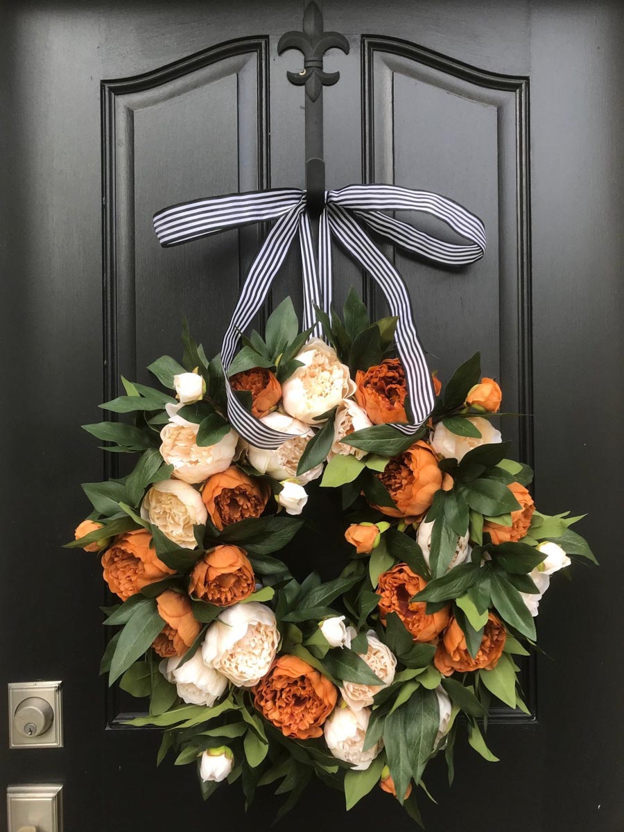 Absolutely gorgeous fall peony wreath! Perfect for dressing up your front door for fall!